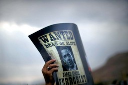 Iranski student drži protuamerički plakat na nedavnom prosvjedu, održanom u znak podrške iranskom nuklearnom programu
