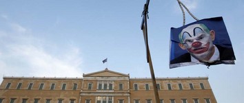 OTPOR GRKA MJERAMA EU
Sliku grčkog premijera
Georgea Papandreoua
prosvjednici su oslikali
kao klauna i objesili
pred zgradu parlamenta u Ateni