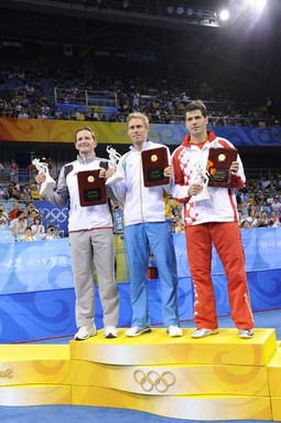 S JÖRGENOM PERSSONOM i Jean-Michelom
Saiveom na OI u Pekingu 2008., kad su dobili plaketu kao jedini stolnotenisači koji su igrali na šest olimpijada
