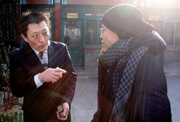 SHANG BAOJUN, odvjetnik, sa suprugom osuđenog