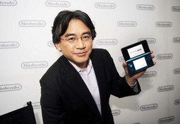 Nintendo 3DS Džepna konzola u ruci Satorua Iwate, šefa Nintenda, prikazuje na svom gornjem ekranu
trodimenzionalnu sliku bez upotrebe naočala