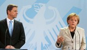 LAVOVSKI UDIO NJEMAČKE
Njemački ministar vanjskih poslova Guido Westerwelle i kancelarka Angela
Merkel;  Njemačka će podnijeti lavovski dio sanacije gospodarstava EU