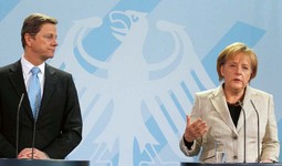 LAVOVSKI UDIO NJEMAČKE
Njemački ministar vanjskih poslova Guido Westerwelle i kancelarka Angela
Merkel;  Njemačka će podnijeti lavovski dio sanacije gospodarstava EU