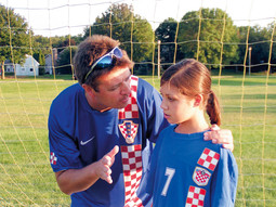 Tomislav Kuzmanovic, Mladen Markac's new defence attorney, with one of his three daughters wearing the jersey of the Croatian National Football Team